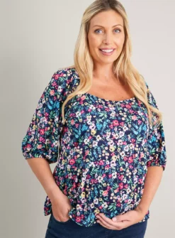 MATERNITY Navy Floral Peplum Top 18